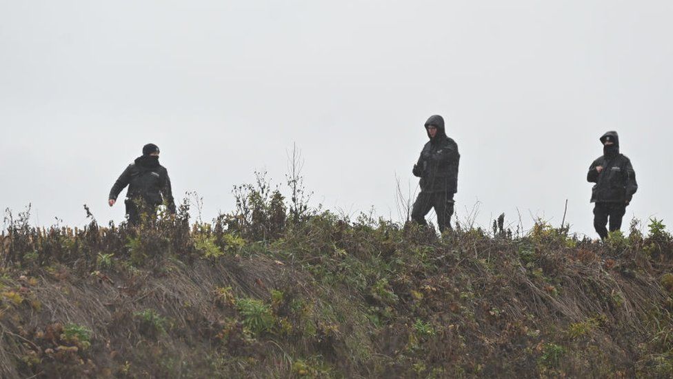 Polish Police search the fields near the village of Przewodow in Poland after a missile from neighbouring Ukraine killed two people near the border