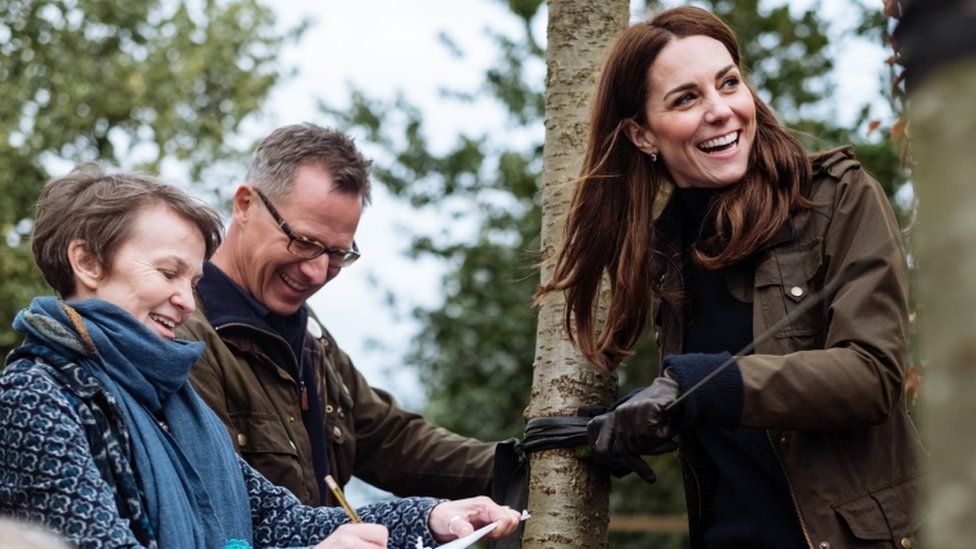 Catherine, Duchess of Cambridge with landscape architects discussing plans for her "Back To Nature" garden