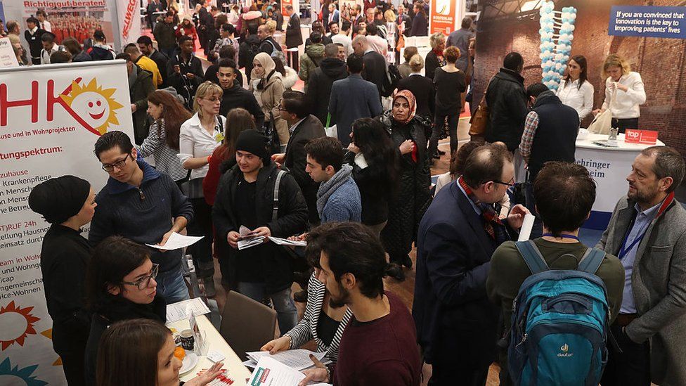Jobs fair for refugees and migrants in Berlin