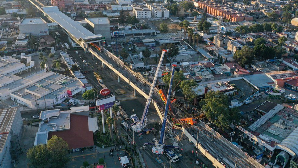An aerial view shows the site of a metro train accident after an overpass for a metro partially collapsed in Mexico City