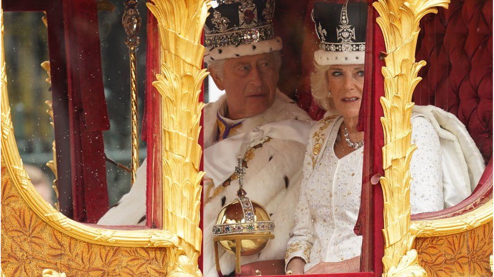 King and Queen in Gold State Coach