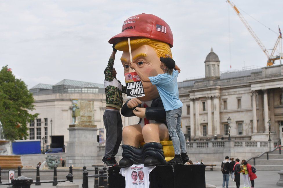 A 16 foot tall model of Mr Trump sat on a golden toilet