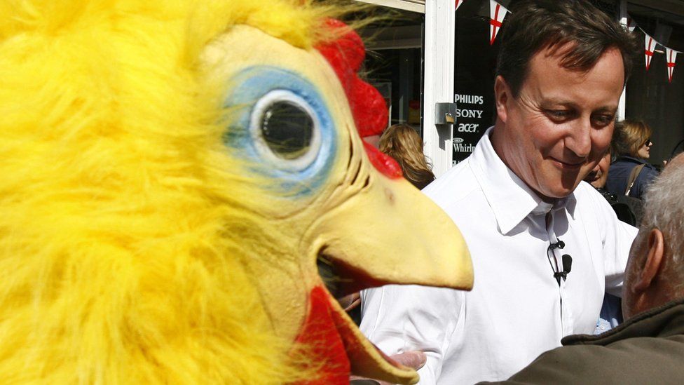 David Cameron with journalist Lee Cain, dressed as a chicken, Staffordshire, 2010