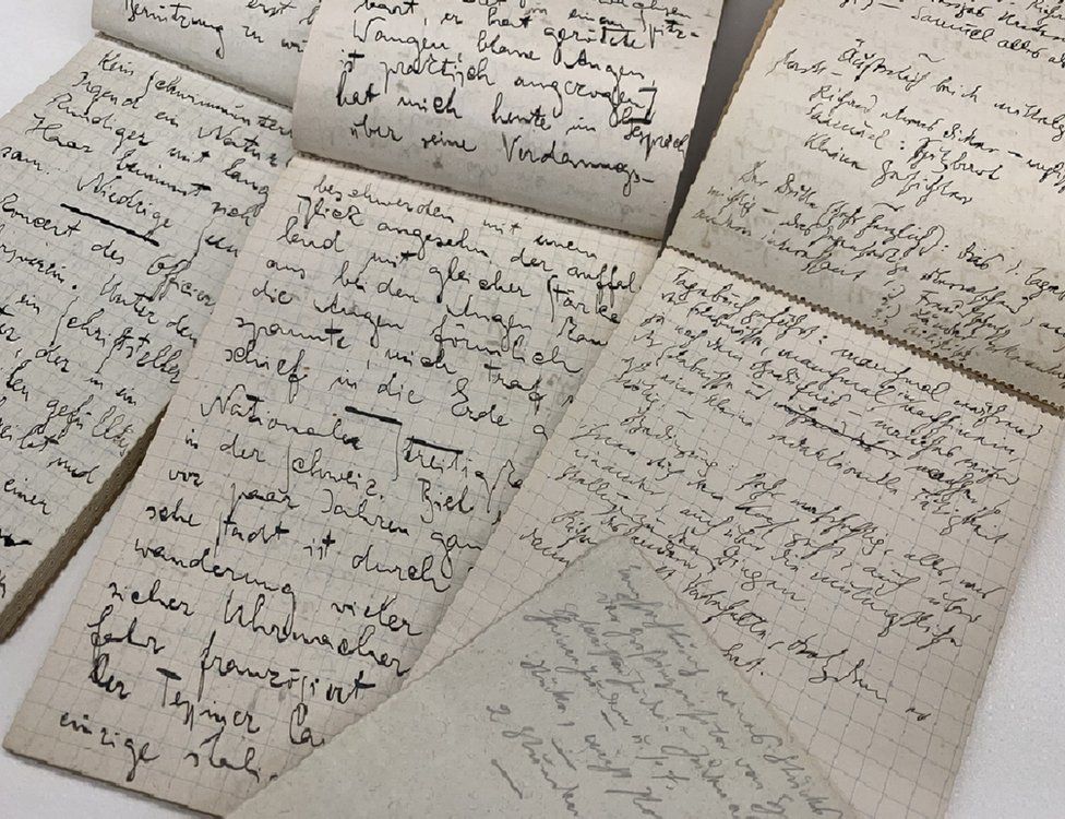 Three notebooks showing Paris travel journals written by Franz Kafka in 1911
