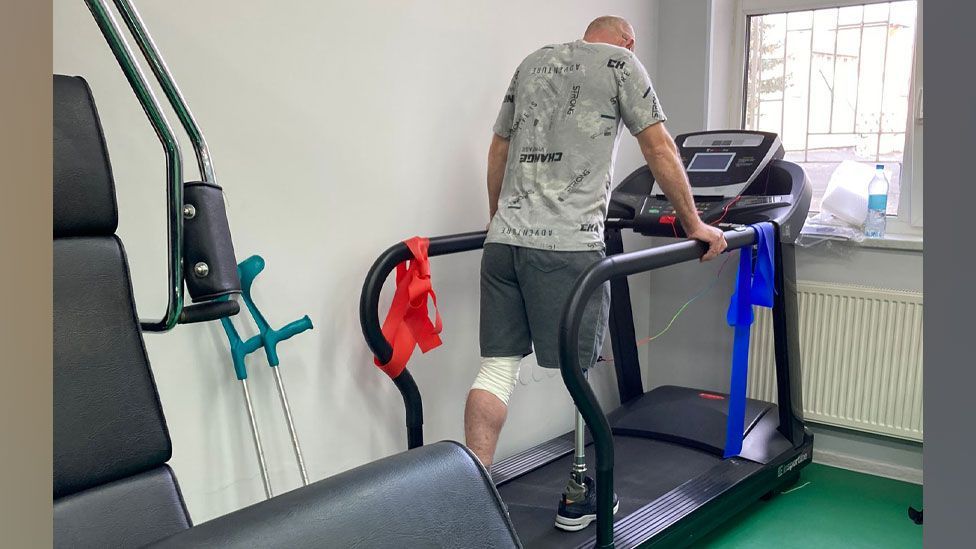 Ukrainian veteran with leg prosthetic on treadmill at  rehabilitation centre, Ukrain 