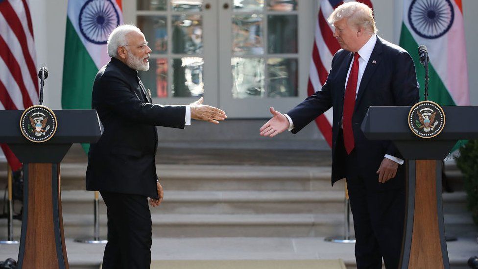 US President Donald Trump and Indian Prime Minister Narendra Modi shake hands