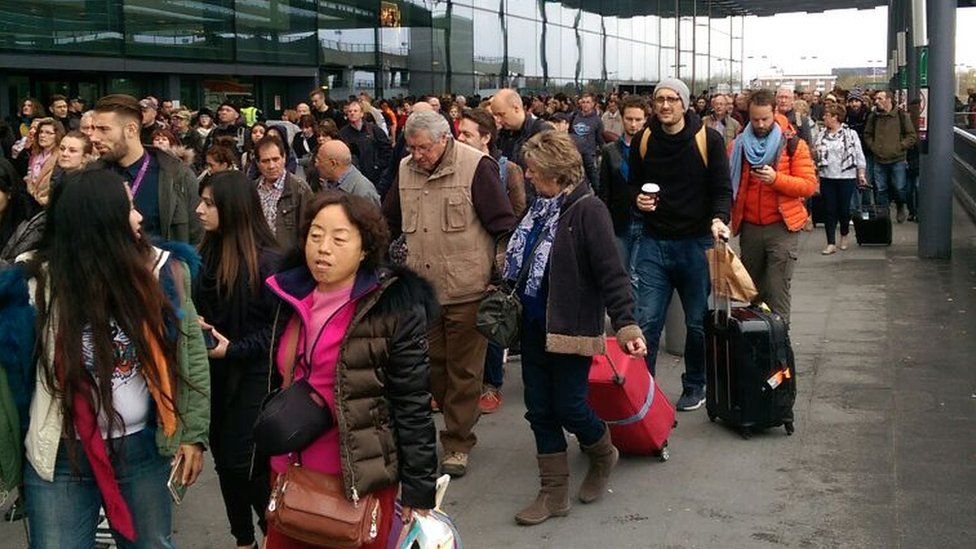 Passengers being evacuated from the north terminal at Gatwick Airport.