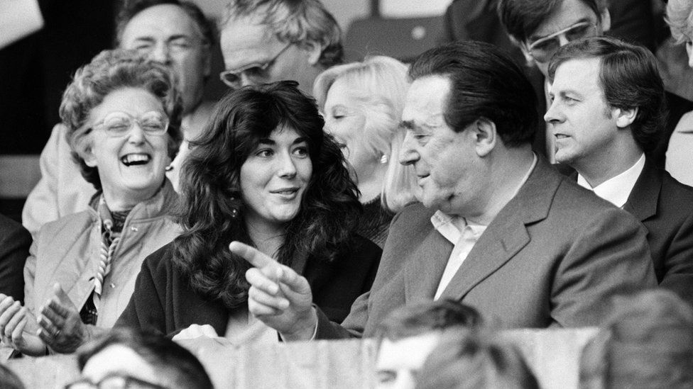 Robert Maxwell and his daughter Ghislaine watch the Oxford v Brighton football match, 13th October 1984.