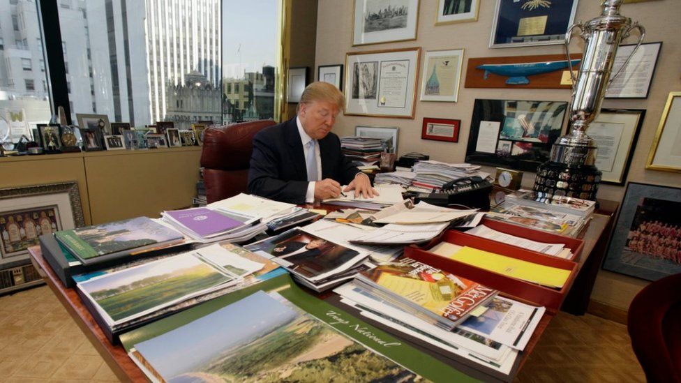 Donald Trump at his desk in Trump Tower in 2010