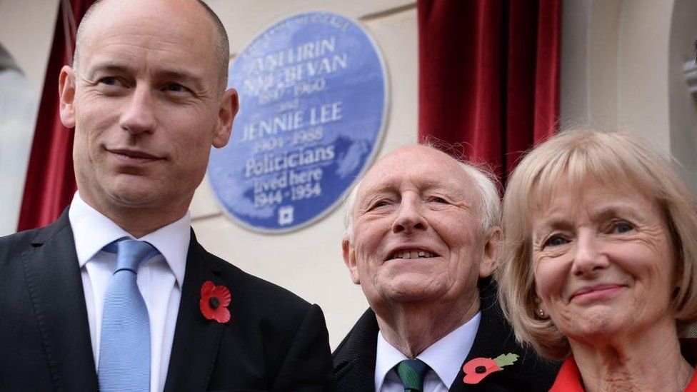 Glenys Kinnock, with her husband Lord Kinnock and their son, Stephen Kinnock MP, at a plaque unveiling in 2015