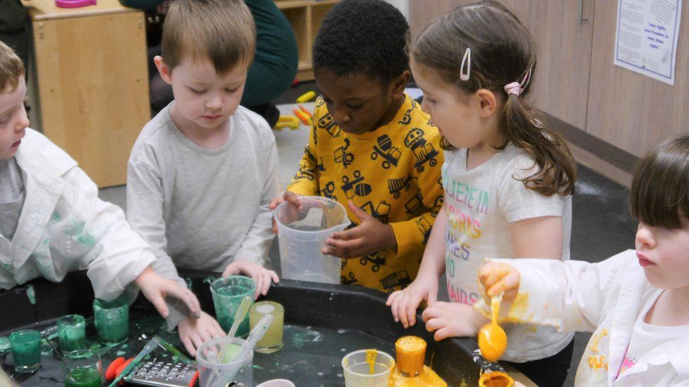Children take part in a science lesson at Tower View Nursery in Glasgow