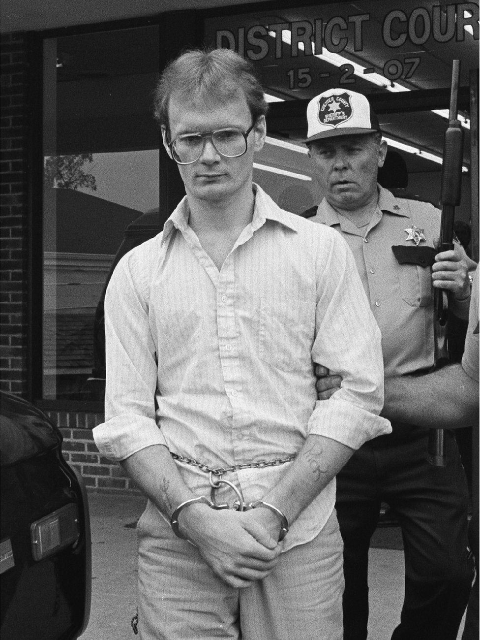 Nick Yarris in handcuffs