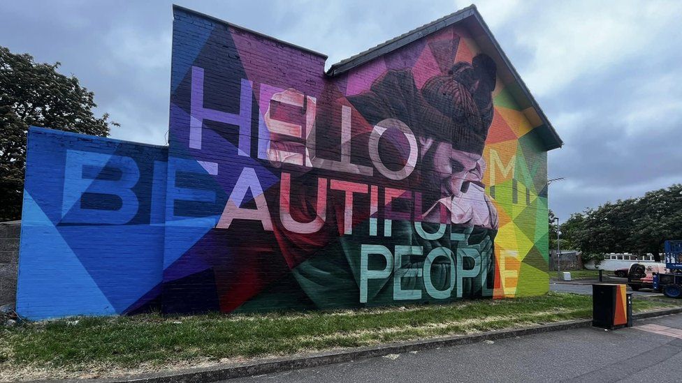 Colourful mural on side of house