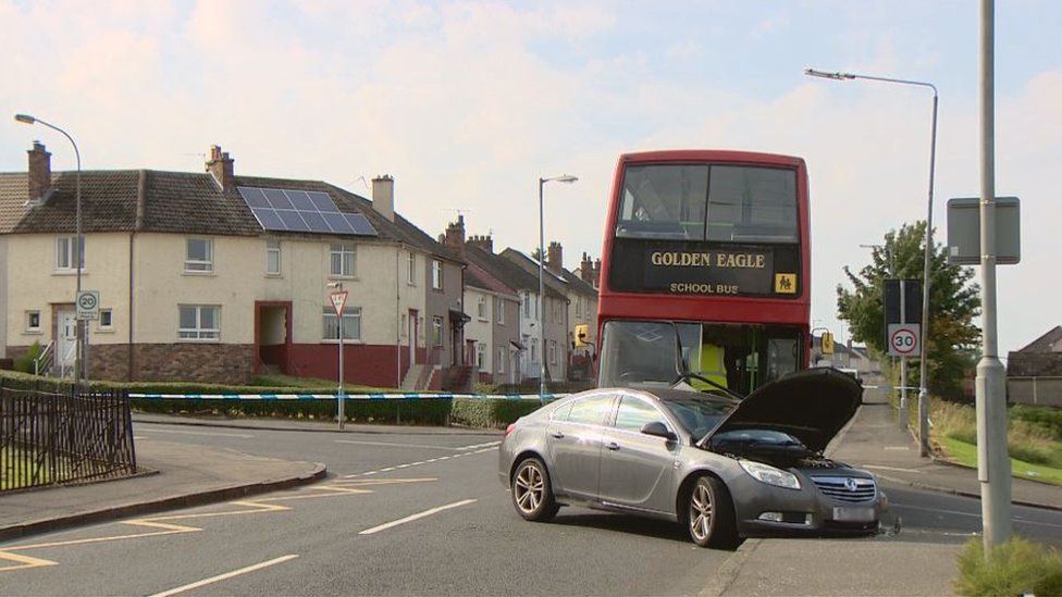 18 children in hospital after bus crash in Airdrie BBC News