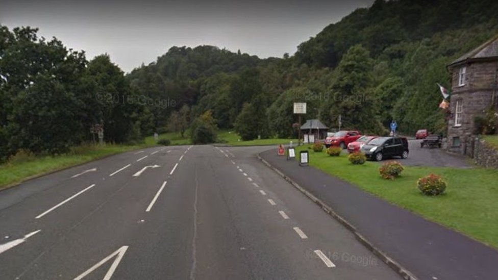 A man has been killed after his car crashed outside a pub
