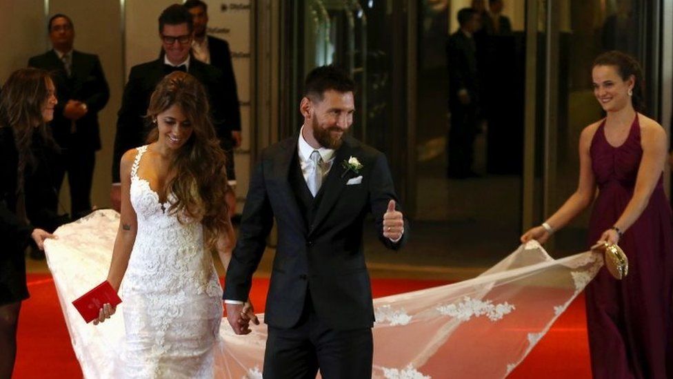 Argentine soccer player Lionel Messi and his wife Antonela Roccuzzo make an appearance for the press at their wedding in Rosario, Argentina, 30 June 2017.