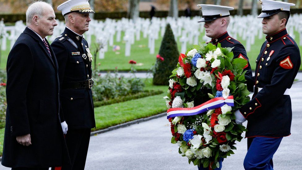 US General John Dunford (second left) and retired United States Marine Corps general John F Kelly White House Chief of Staff visit the Aisne-Marne American Cemetery and Memorial in Belleau, 10 November 2018