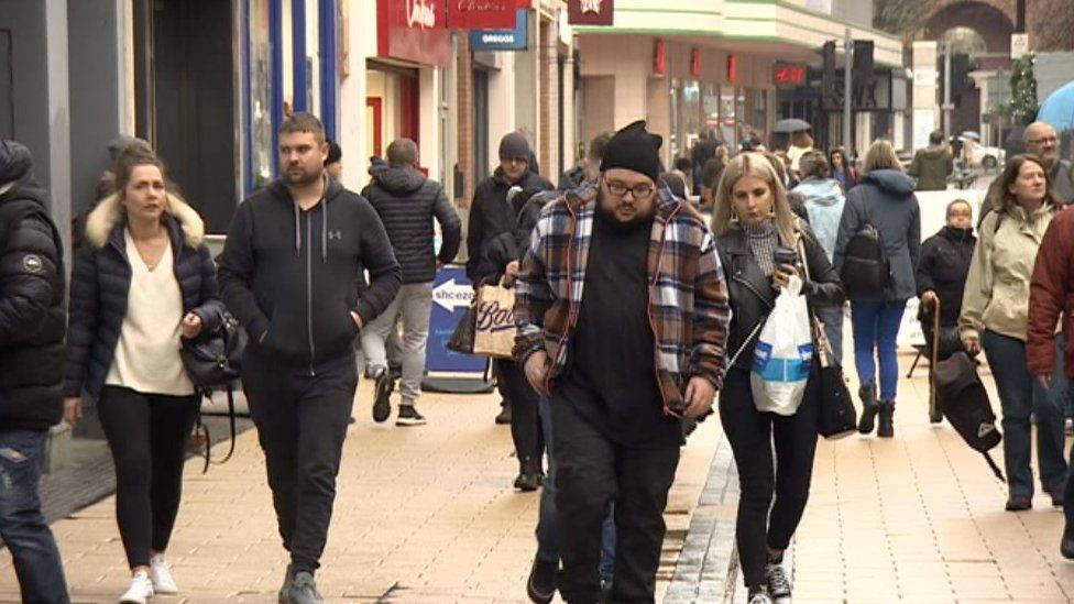 Shoppers in Bristol.