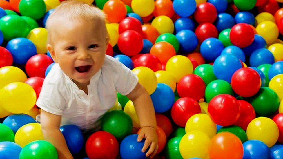 Child in ball pool