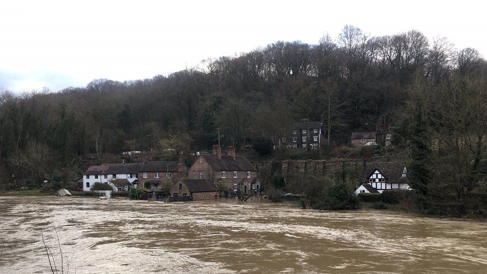 Flood waters reach houses in Ironbridge, Shropshire