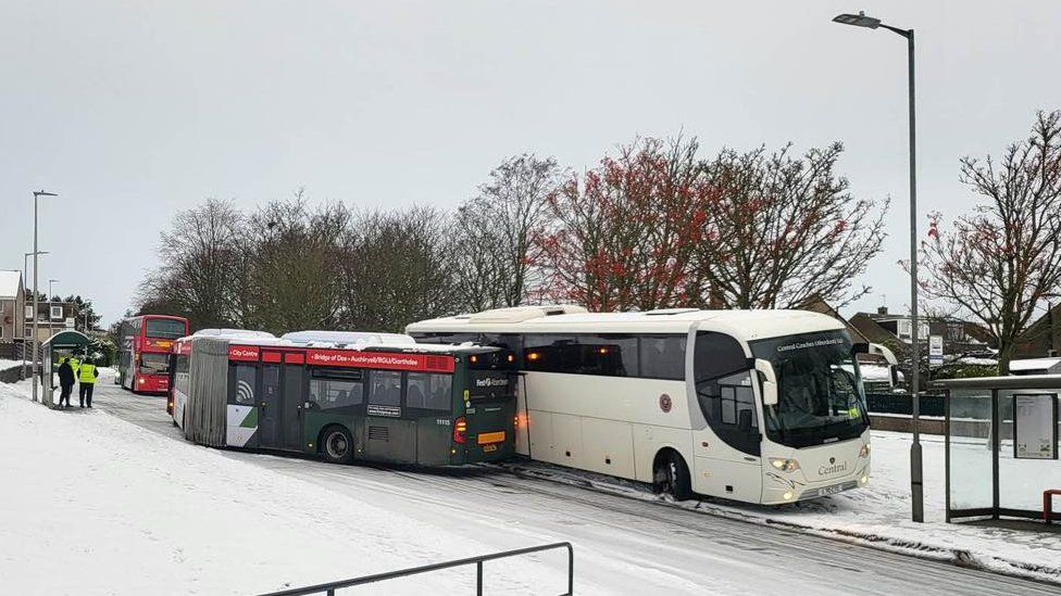 Buses in snow