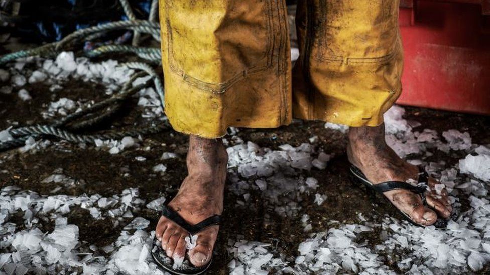 A man in flip flops in the cold - photo from NCA's 'Invisible People' exhibition