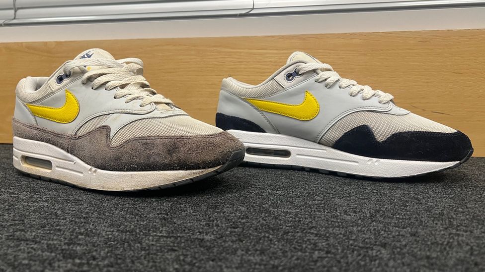 A pair of Nike trainers. One is old and tatty, while one has been restored to its former glory.
