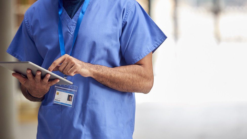 Medical worker in hospital ward