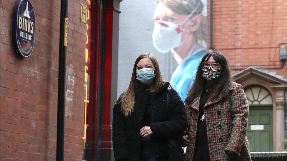 Two women in face coverings in Manchester