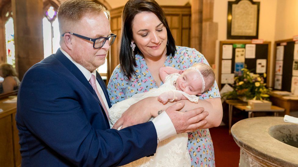 Laura and Dave at Ivy's christening