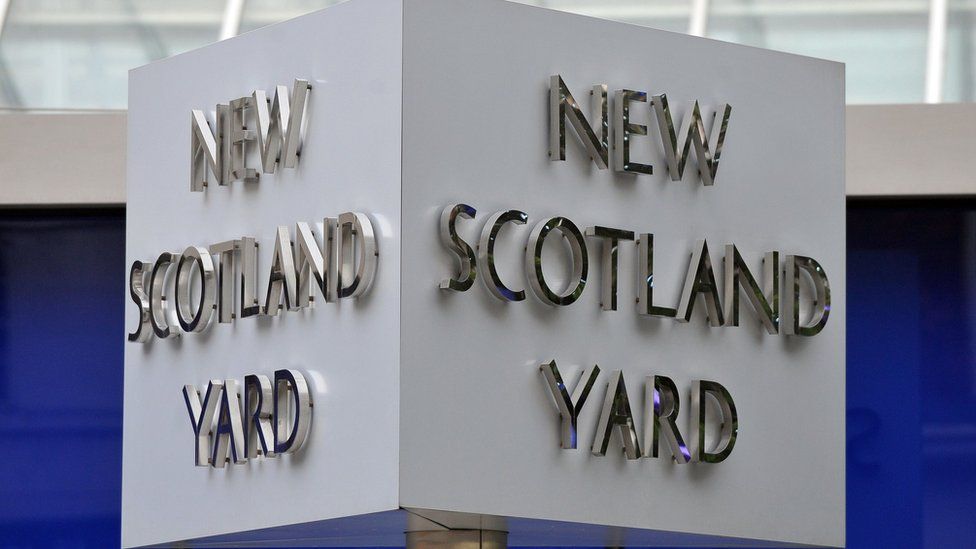 The New Scotland Yard sign outside the Met Police headquarters