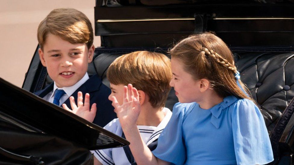 Princes George and Louis, Princess Charlotte, the Duchess of Cambridge and Duchess of Cornwall arriving at Horse Guards' Parade by carriage