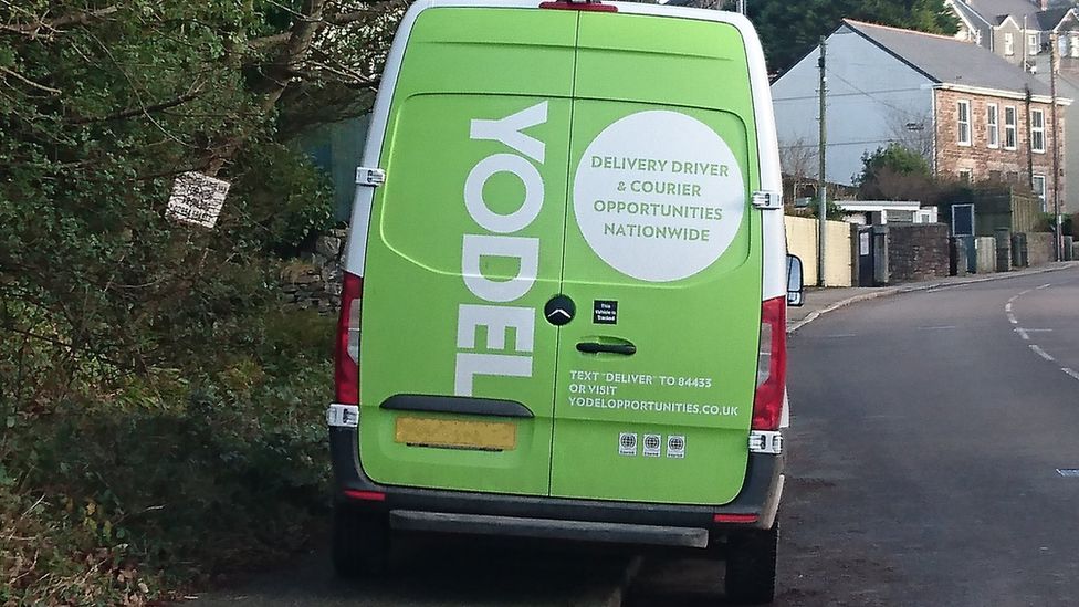 Yodel van parked on path