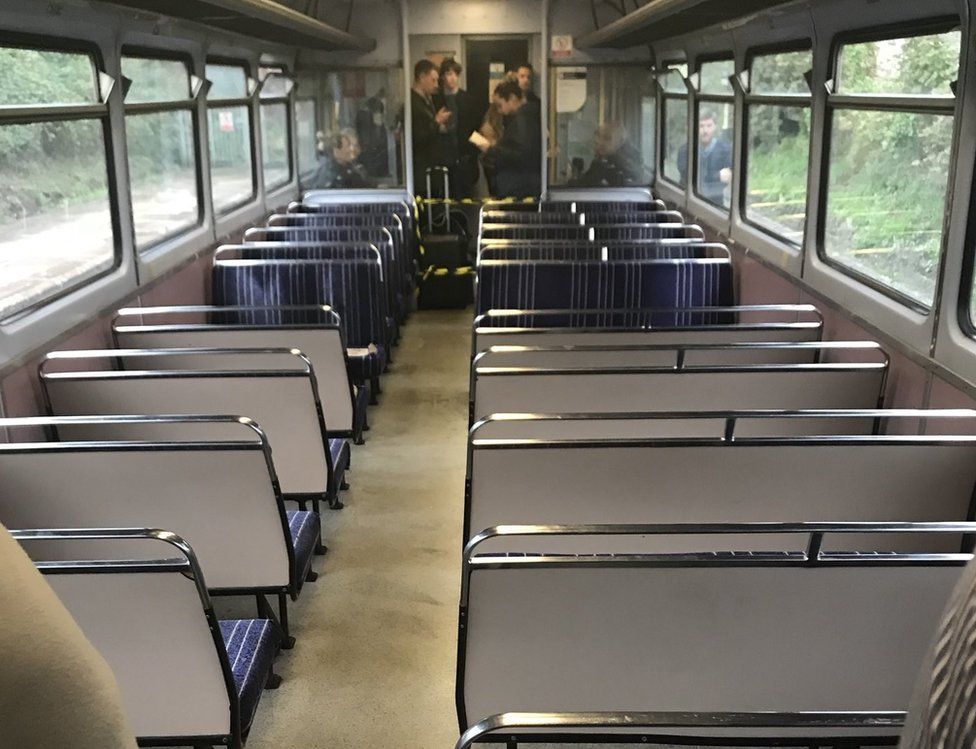 Train with rows of empty seats