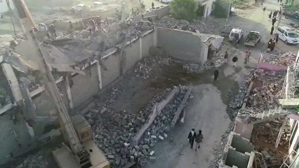 The site of a detention centre following an air strike