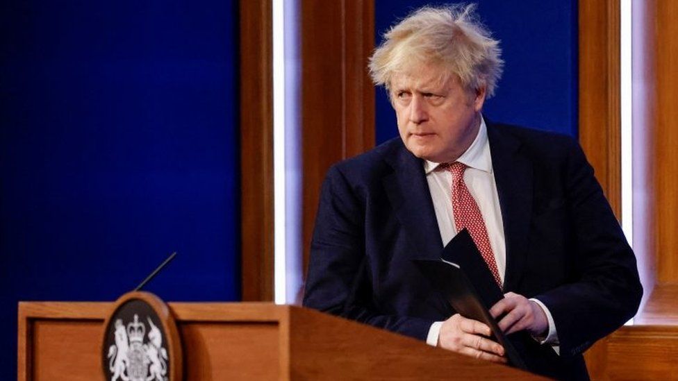 Boris Johnson attends a news conference in Downing Street