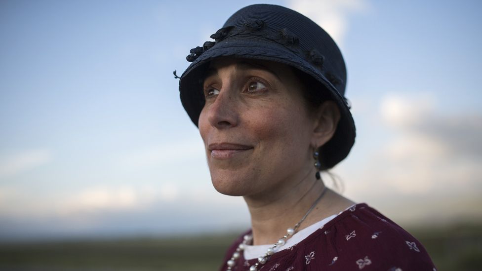 Shani Taragin, 45, a women's health and Jewish law teacher in a wheat field at the Hula Valley in the Upper Galilee in northern Israel during the Passover holiday. (photo by Heidi Levine for BBC)