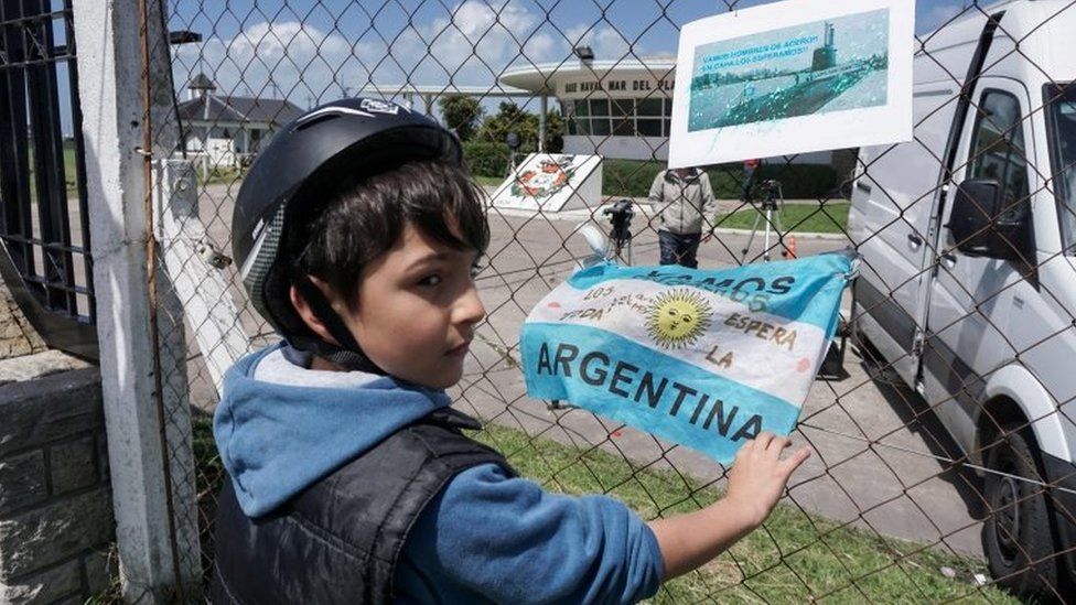Banners and Argentine flags with message in support of submarine crew members are displayed outside Argentina's Navy base in Mar del Plata, on the Atlantic coast south of Buenos Aires, on November 19,