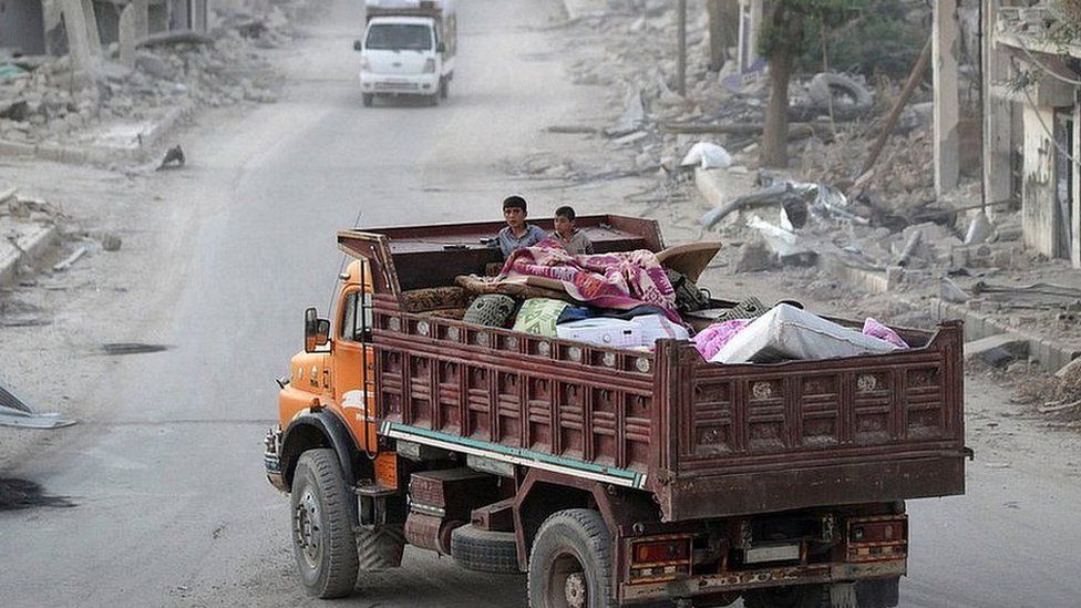 Civilians fleeing the bombing in Aleppo
