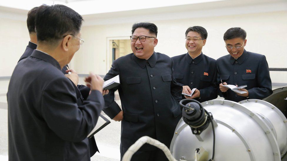 North Korean leader Kim Jong-un inspecting a bomb (undated photo released 3 September)
