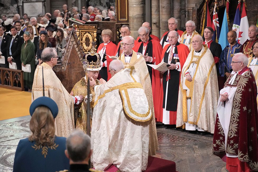 King Charles III receives The St Edward's Crown during his coronation ceremony in Westminster Abbey
