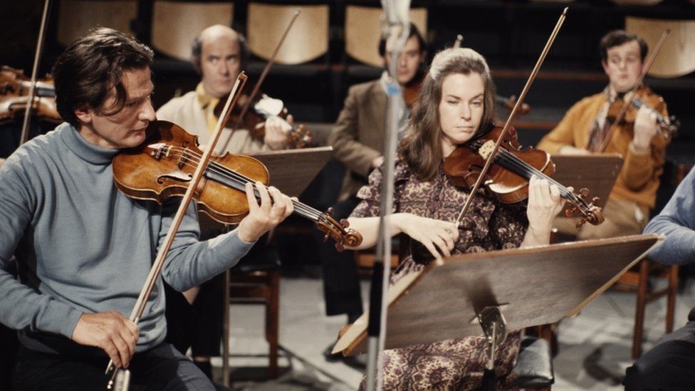 English conductor and violinist Neville Marriner (left) playing with an ensemble, circa 1965.