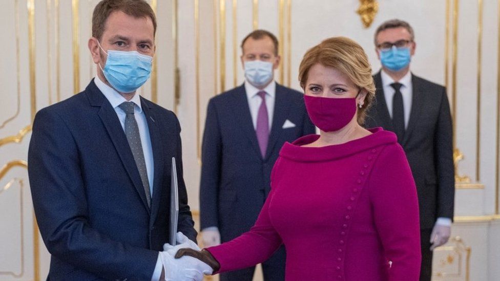 Slovakia"s President Zuzana Caputova and Prime Minister Igor Matovic wearing protective face masks attend the cabinet"s inauguration at Presidential Palace in Bratislava