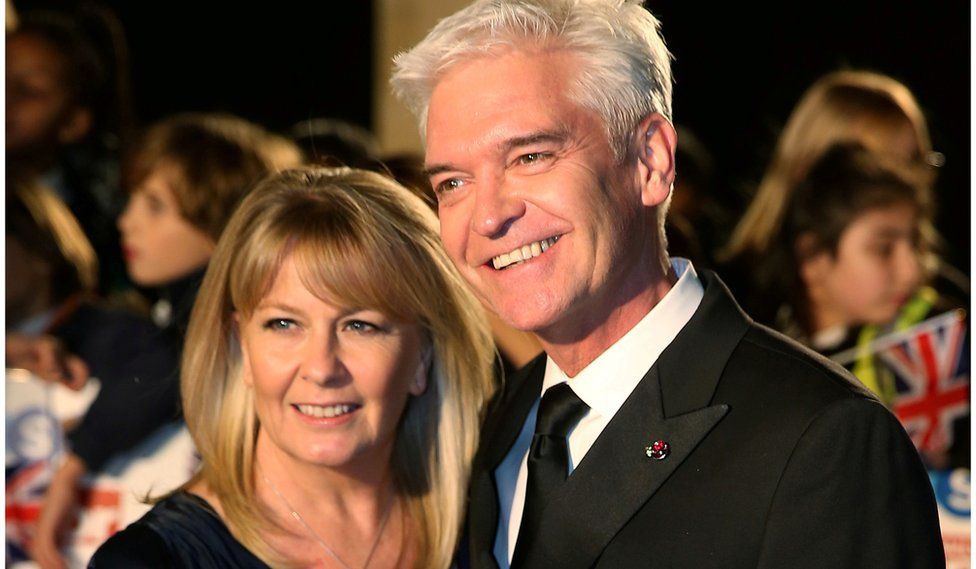 Television presenter Phillip Schofield arrives with his wife Stephanie Lowe for the Pride of Britain Awards in London, Britain October 30, 2017