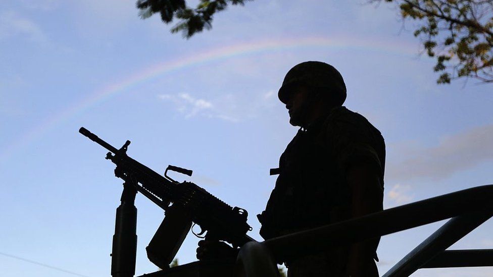 A silhouette of a soldier patrolling in Iguala after the disappearances in 2014