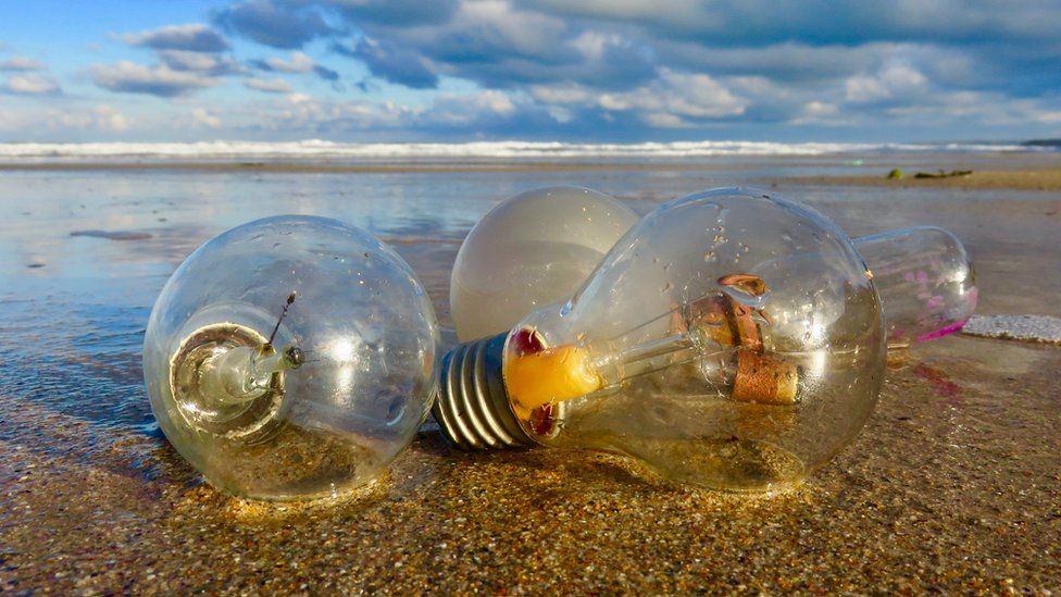 Light bulbs on the sand