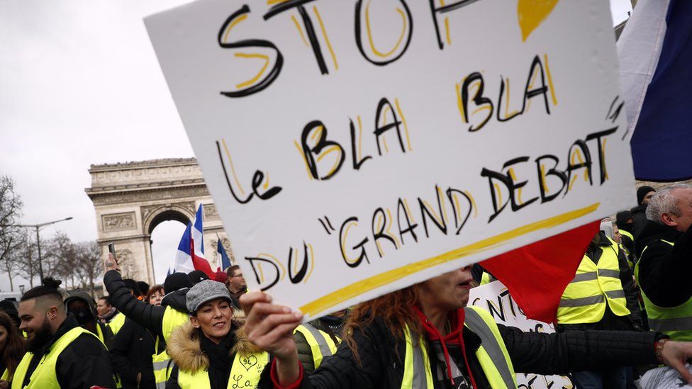 Protesters on 26 January in Paris complain at the "Blah Blah" of the Grand Debate