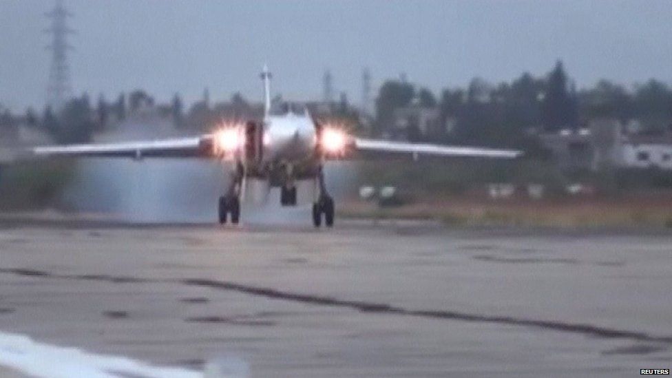 A frame grab taken from footage released by Russia's Defence Ministry October 15, 2015, shows a Sukhoi Su-24M military aircraft landing on the tarmac at the Hmeymim air base near Latakia, Syria.