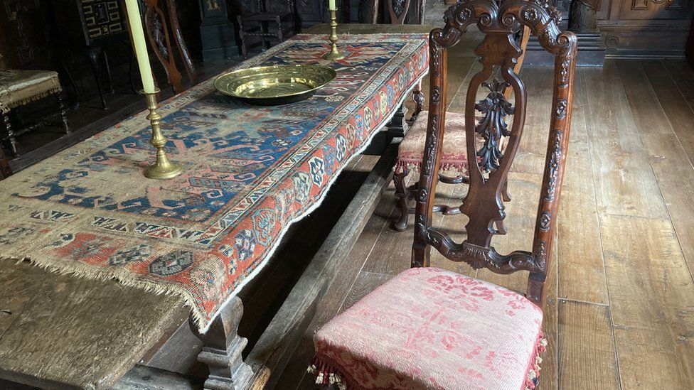 One of the chairs back in the dining room in Gwydir Castle (BBC)