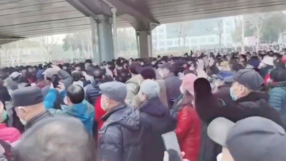 Demonstrators gather outside Zhongshan park to protest changes to medical benefits in Wuhan, China February 15, 2023